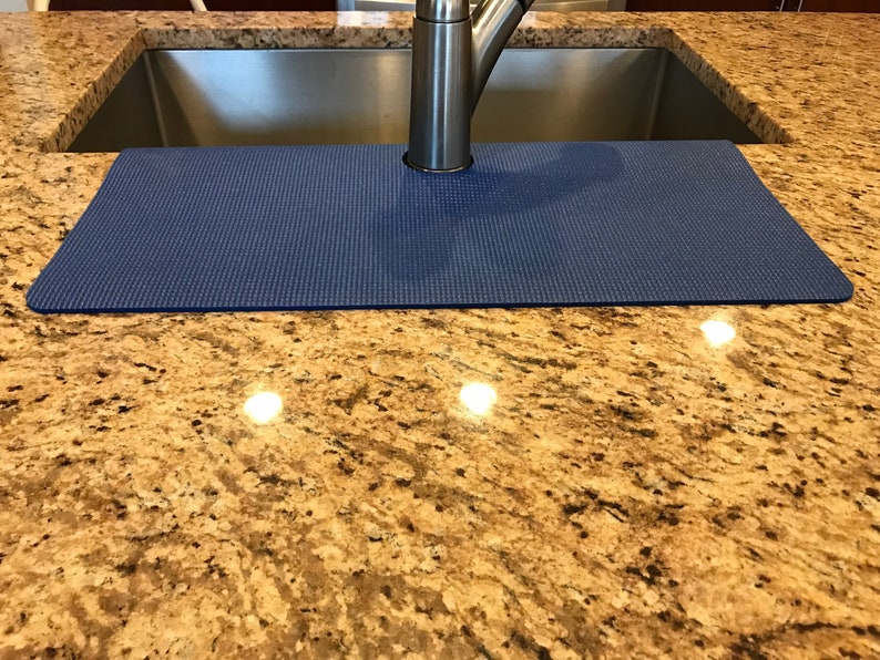 granite protector around sink