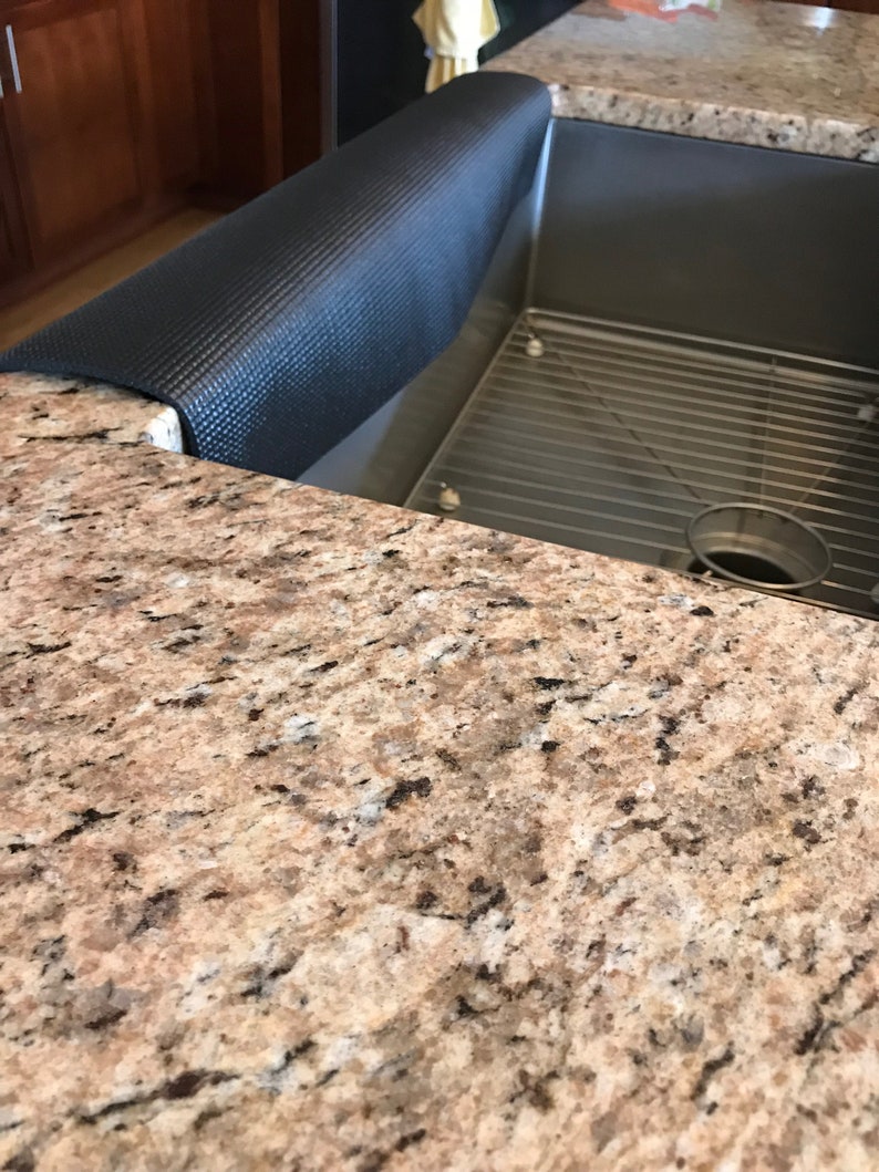 granite protector around sink