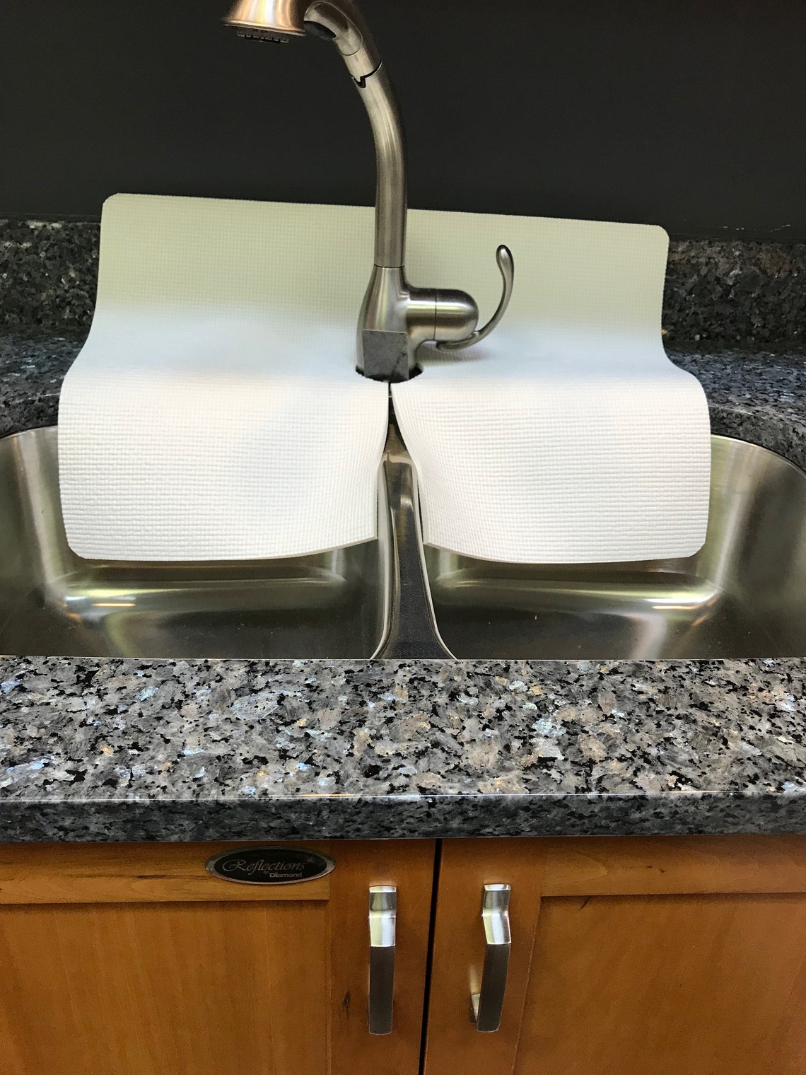 granite protector around sink