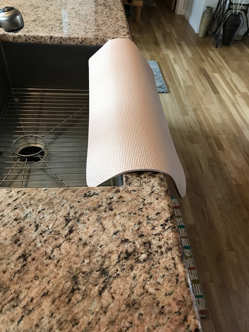 granite protector around sink