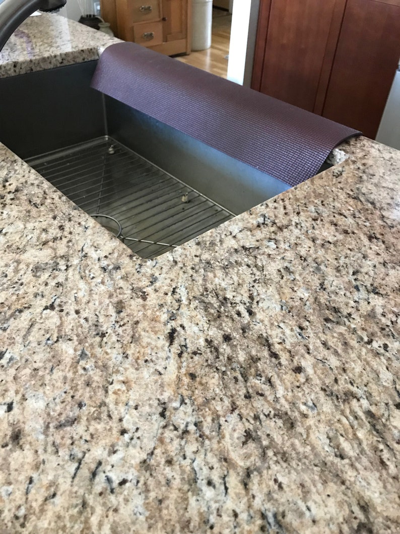 granite protector around sink