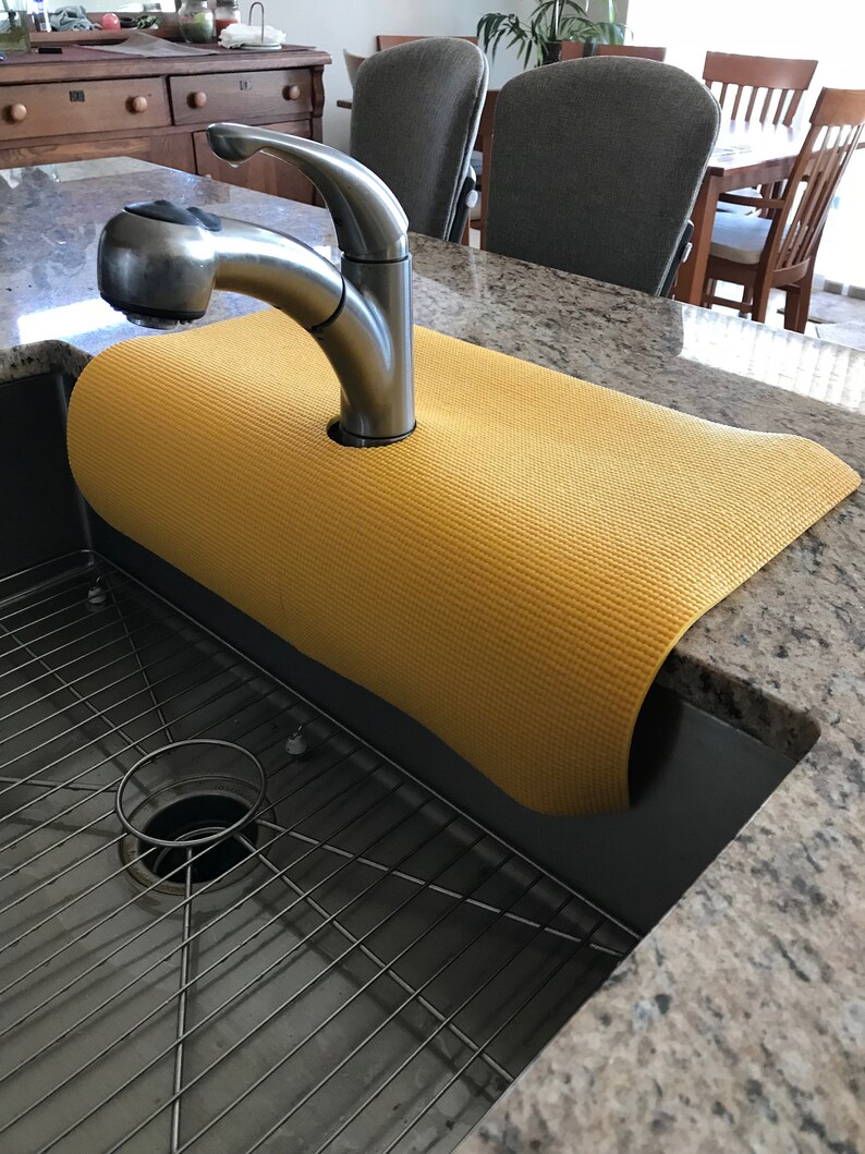 granite protector around sink