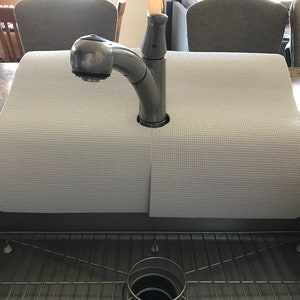 granite protector around sink