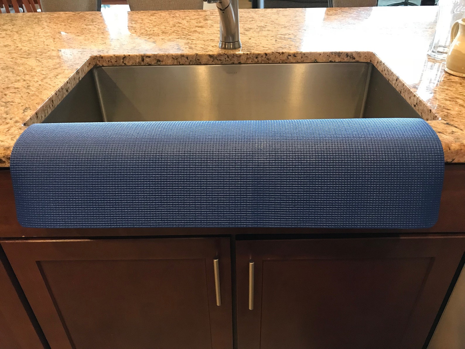 granite protector around sink