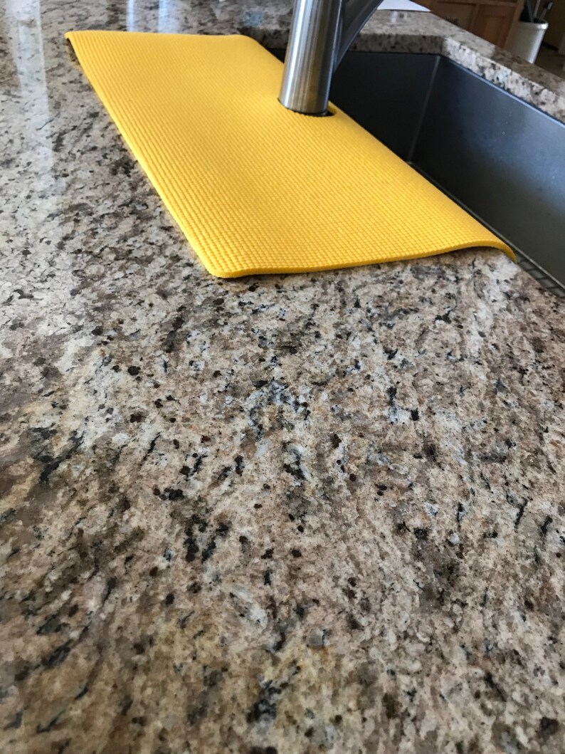 granite protector around sink