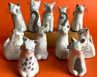 White small raku ceramic cats