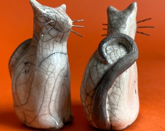 Black and white small raku ceramic cats