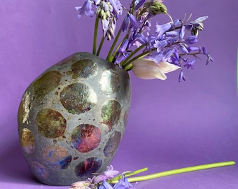 Black and copper rainbow spotty raku vessel pot