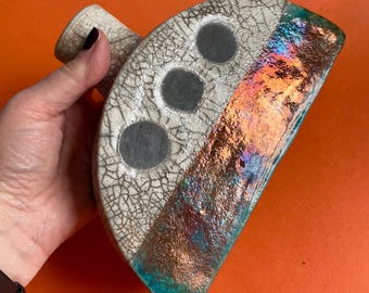White and copper raku vessel pot