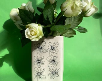 Ceramic cream and black flower vase