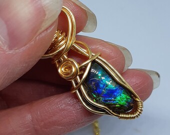Natural Ammolite from Alberta  Canada. Lots of sought after blues and teals and greens. Gem status granted in 1987