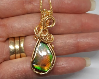 Memorizing colorful natural Alberta Canada ammolite/gem of Alberta canada/ non tarnish 14k gold wie wrapped Ammolite/ gem status 1987