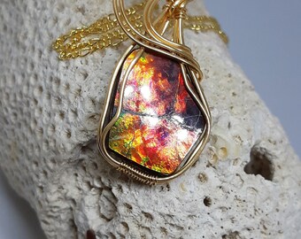 Like a volcano on fire with this awesome color Ammolite from Alberta Canada