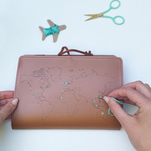 Stitch where you've been! World Travel Notebook in Brown faux leather with world map, needle & thread and pen