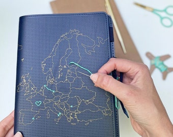 Stitch your travels around Europe! Travel Notebook in navy faux leather with gold map of Europe and needle & thread