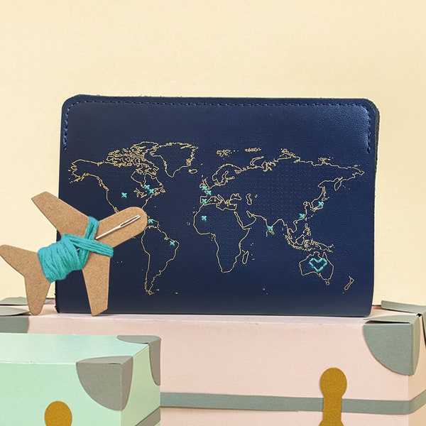 Stitch where you've been Travel Passport Cover in Vegan leather- Navy with Gold world map, with needle & thread. Customize with your travels