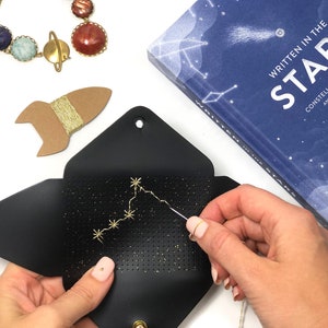 Stitch your star sign zodiac envelope purse- with needle & gold thread