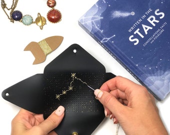 Stitch your star sign zodiac envelope purse- with needle & gold thread