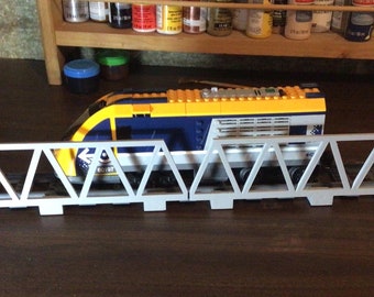 Par de toboganes sobre caballetes de puente para vías de tren LEGO