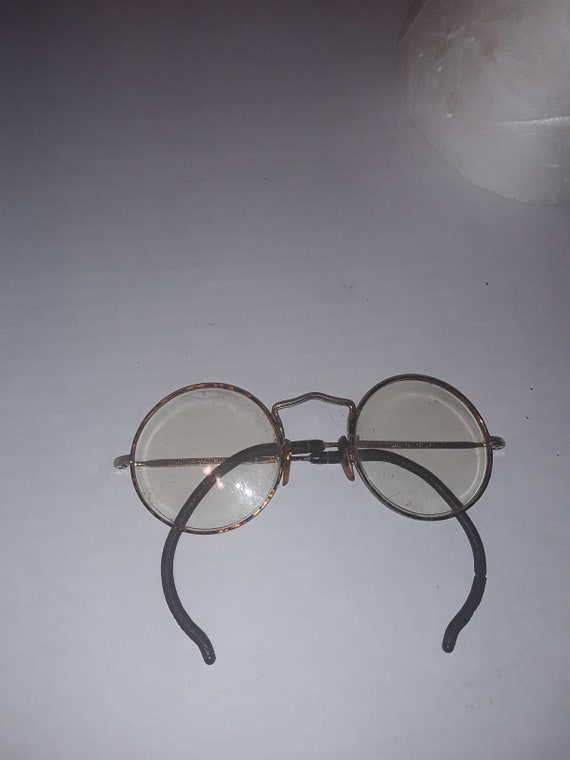 John lennon-style Instant Karma glasses