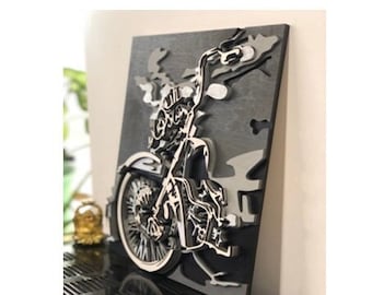 May include: A black and white 3D wall art sculpture of a motorcycle with a camouflage background.