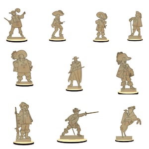 Puede incluir: Conjunto de diez figuras de madera cortadas con láser que representan figuras históricas con atuendos del siglo XVII. Las figuras llevan todas sombreros y tienen espadas u otras armas. Algunas figuras están a caballo.