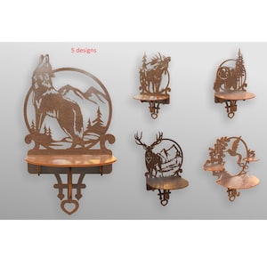 May include: Five wooden wall shelves with different nature-themed designs. Each shelf features a circular cutout with a deer, wolf, bird, or bear silhouette. The shelves are made of brown wood and have a simple, rustic style.
