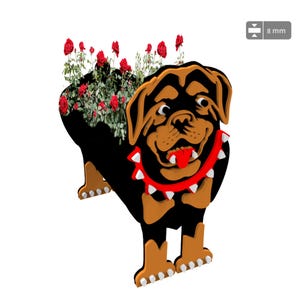 May include: A wooden Rottweiler dog planter, painted black and brown, with a red spiked collar and a tongue sticking out. The planter is filled with red roses. The planter is 8 mm thick.