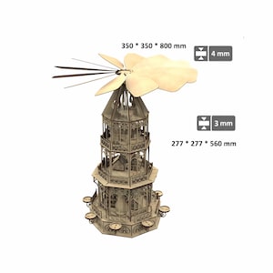 May include: A wooden Christmas pyramid with a multi-tiered design. The pyramid features a rotating top with blades and intricate cut-out details. Dimensions are 350 x 350 x 800 mm (13.8 x 13.8 x 31.5 inches).