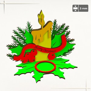 May include: A yellow candle with a red ribbon that says "Merry Christmas" is surrounded by green holly leaves and red berries. The candle is on a green base with a red circle in the center.