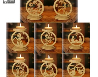May include: Wooden candle holders with various Christmas-themed cutouts, including ornaments, a reindeer, an angel, a candy cane, a nativity scene, candles, a bell, and bells. Each holder has a circular design and holds a lit candle. The holders are made of light-colored wood.
