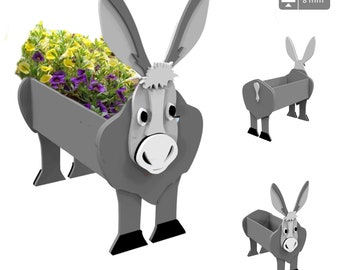 May include: Gray donkey-shaped planter with a flower pot and flowers. The planter is made of wood and has a 3D donkey head with black hooves. The planter is 8 mm thick.