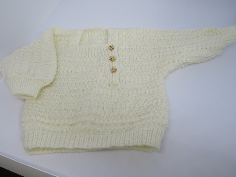 cream baby jumper