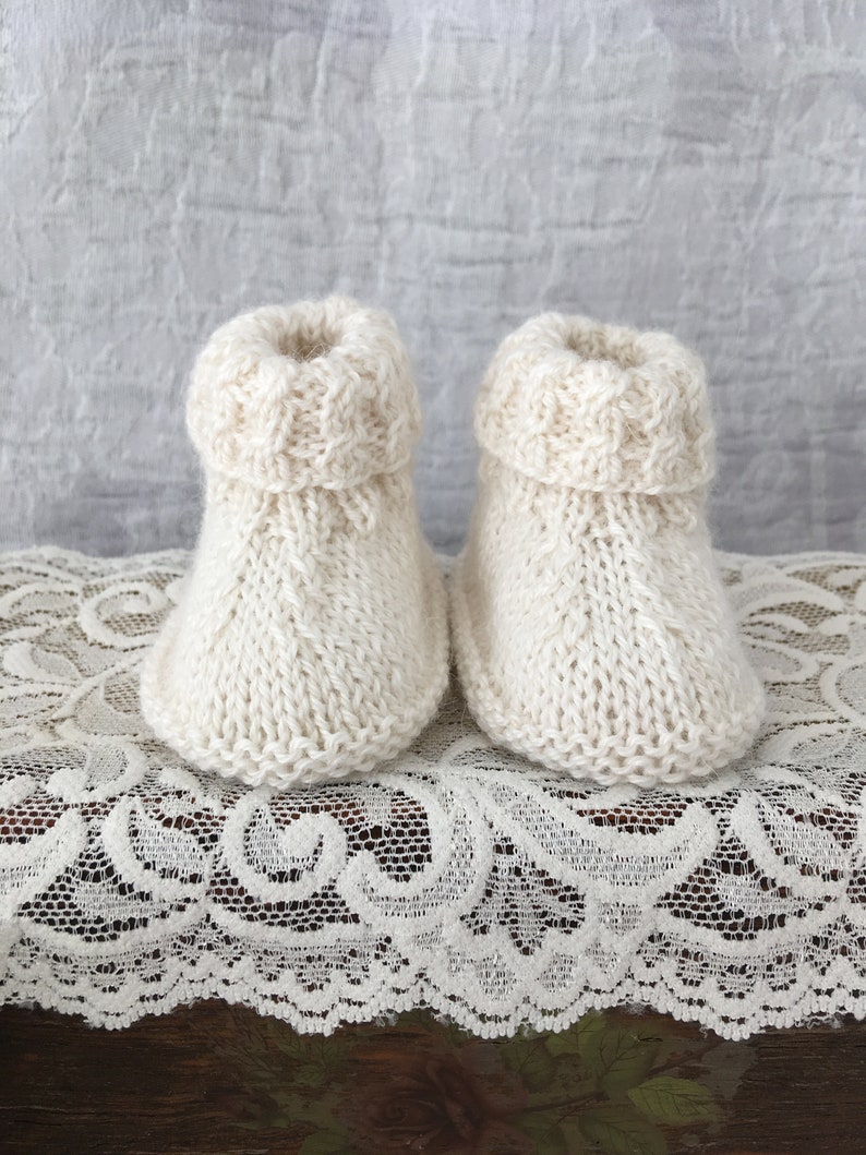 cream baby booties