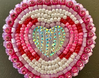 Shiny white center heart earrings