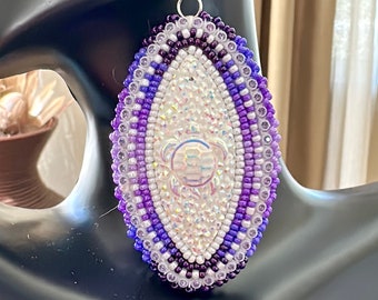Purple and white turtle earrings