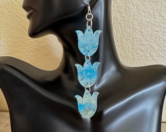 Blue Tulip pearlescent glitter acrylic earrings.