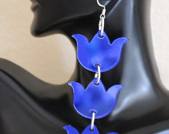Blue Tulip mirrored earrings.