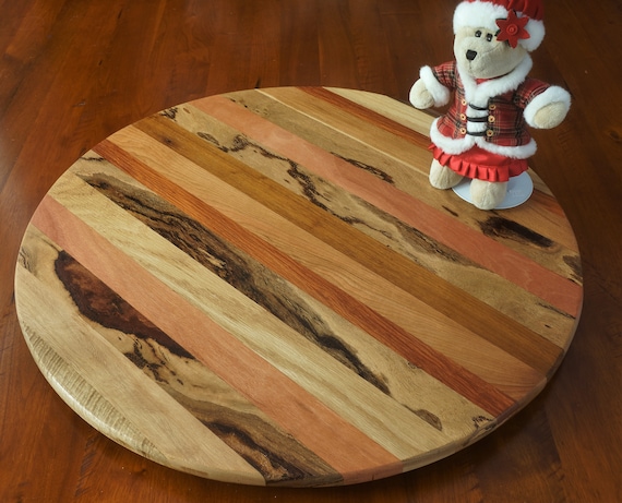 Lazy Susan in mixed timbers. 700mm Diameter.