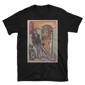 May include: A black t-shirt with a graphic print of a man with a motorcycle and a woman standing in a doorway. The graphic is in a cartoon style and features a red, white, and blue flag in the background.