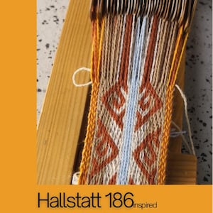 May include: Tablet weaving project in progress, featuring a Hallstatt 186 inspired pattern. The woven fabric displays a geometric design in shades of orange, brown, white, and blue. The text "Lost Thread" and "Pattern #01 for TABLET WEAVING" are visible.