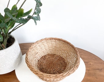 ヴィンテージのラウンドバスケット - Etsy 日本