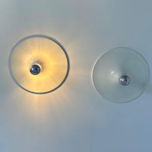 Pair of vintage wall lights, white lacquered metal, Italy 1970.
