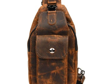 May include: A brown leather sling bag with a distressed finish. The bag features a front pocket with a metal snap closure, a top handle, and a black zipper. The bag has a shoulder strap and a metal clasp.