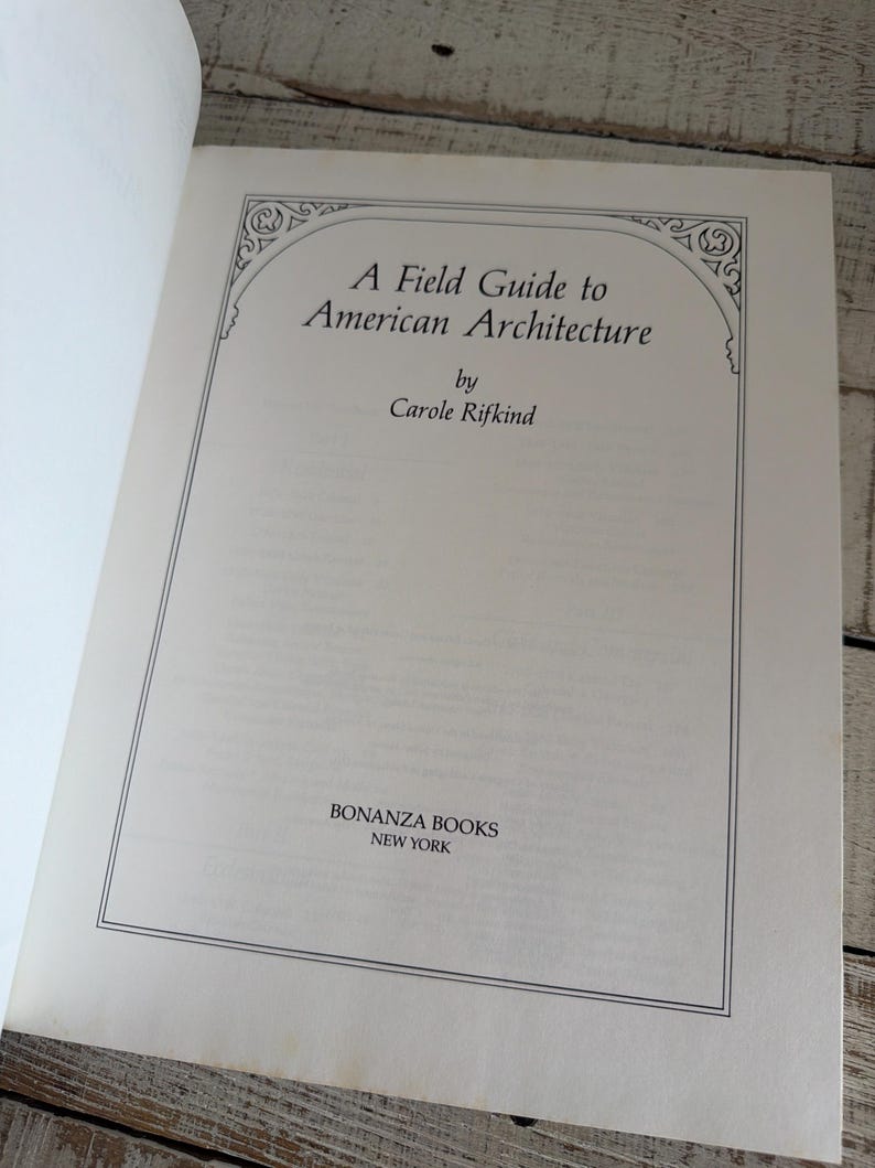 May include: The title page of the book A Field Guide to American Architecture by Carole Rifkind, published by Bonanza Books, New York. The text is printed in black on a white page, enclosed within a thin rectangular border with decorative corners.