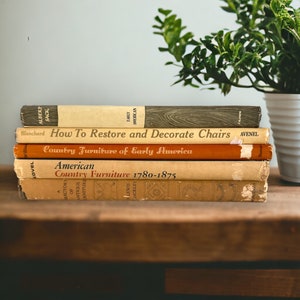 May include: A stack of five vintage books about American country furniture, including "How To Restore and Decorate Chairs" and "Country Furniture of Early America".