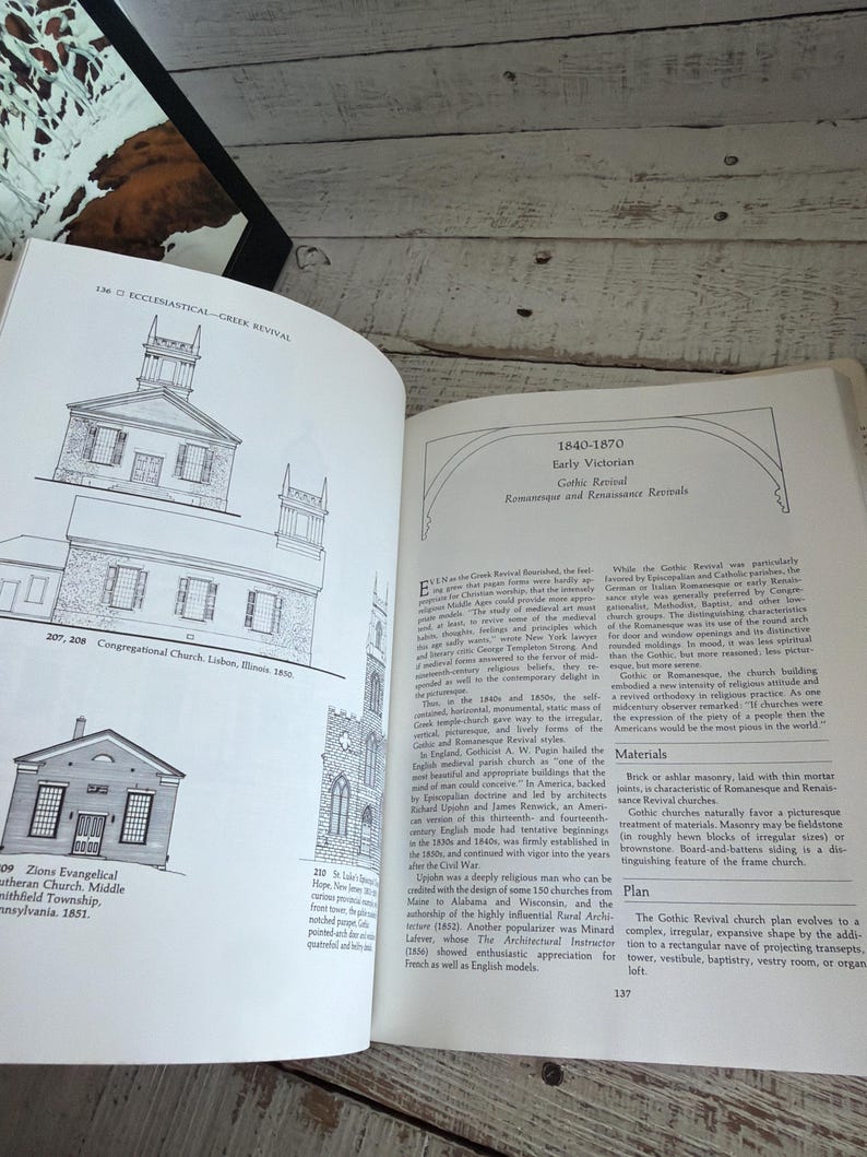 May include: An open book featuring architectural illustrations of churches on the left page and text titled 1840-1870 Early Victorian Gothic Revival on the right page. The black and white line drawings depict the Congregational Church and Zions Evangelical Church.