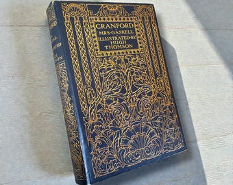 Libro antiguo de Cranford, 1907, Macmillan, tapa dura azul y dorada ornamentada