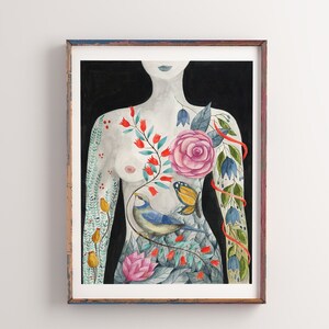 May include: A watercolor painting of a woman's torso with a floral design. The flowers are in shades of pink, red, blue, and green. A small blue bird is perched on a branch in the center of the design.