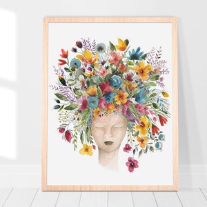 May include: Watercolor painting of a person with their eyes closed, surrounded by a colorful floral crown. The flowers are in shades of pink, yellow, blue, and green.